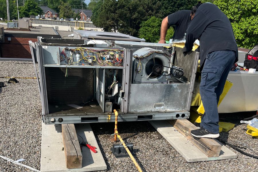 Heat Flow HVAC location hvac technician newmarket installing a